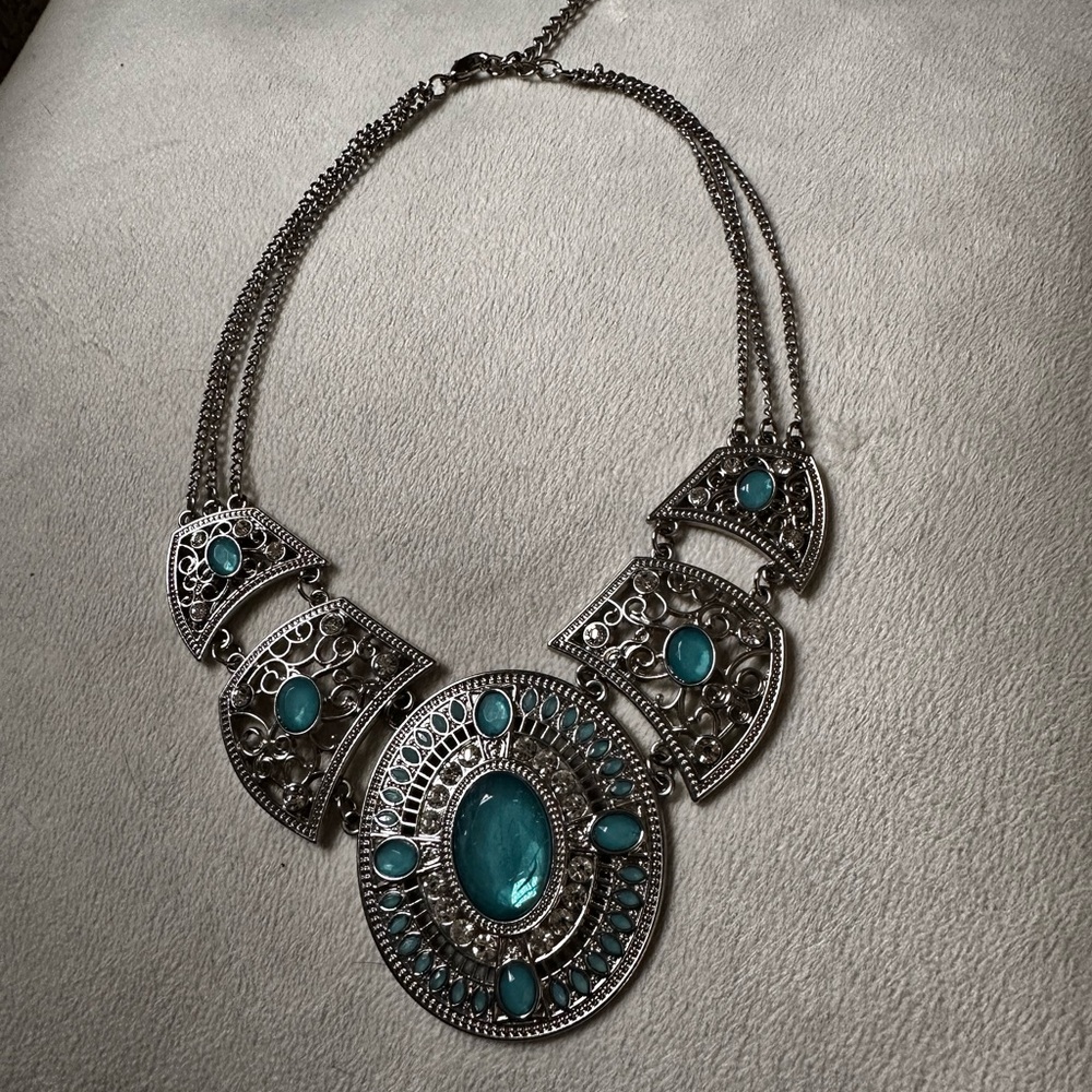 Intricate Silver Necklace with Turquoise color Accents